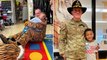 Soldier dressed as mascot surprises son on first day of school after year deployment
