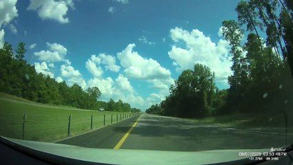 Impatient Driver Tries To Weave Between Cars