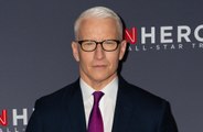 Anderson Cooper has fought “to forget” the time Madonna spanked him onstage