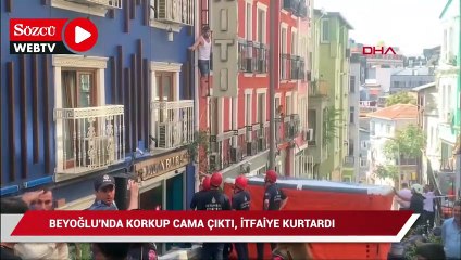 Beyoğlu'nda korkup cama çıktı, itfaiye kurtardı
