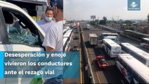 Manifestantes y automovilistas se confrontan por bloqueo en la México-Pachuca