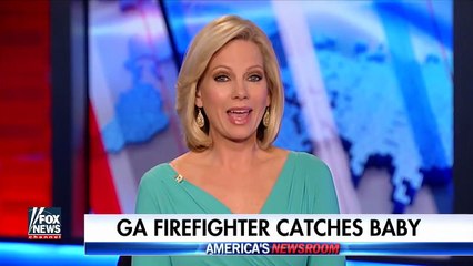 Un pompier sauve un enfant jeté par la fenêtre d'un immeuble en flammes