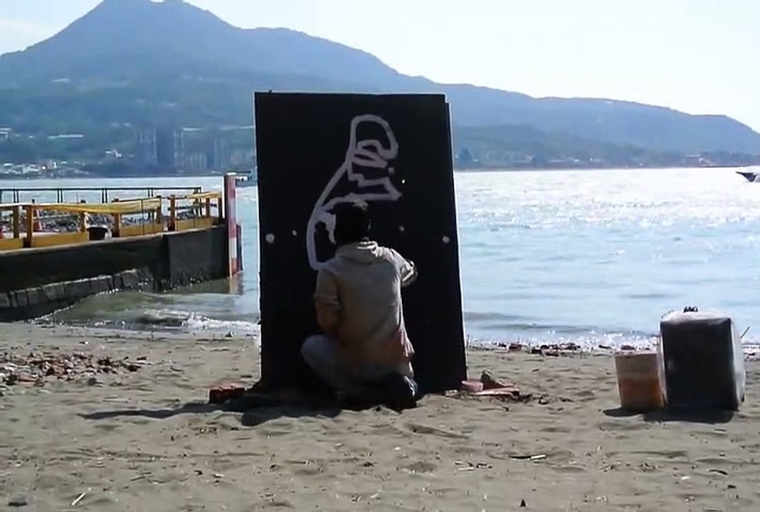 Ce street-artiste réalise une incroyable peinture de Bruce Lee en 2 minutes !