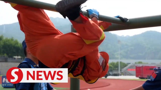 A burning passion: Firefighting competition heats up in China's Fujian