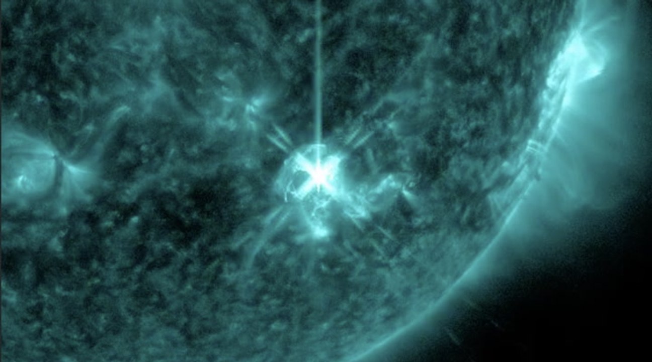 Double Solar M-Flares Blast Massive Coronal Mas...