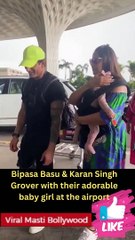 Bipasa Basu & Karan Singh Grover with their adorable baby girl at the airport