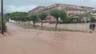 Spain: Muddy water rushes down street as torrential rain causes major flooding