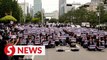 South Korean teachers rally after colleague's death