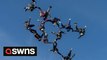 Group of 12 female skydivers set new British record for largest upside down formation jump