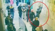A Palestinian woman terrorist in hizab- abaya- burqa attempts to stab an Israeli policeman on duty