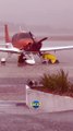Funcionários de aeroporto seguram avião durante tempestade em BH