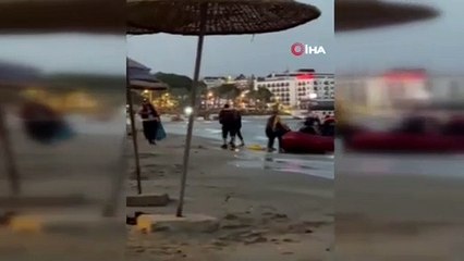 Kaçak göçmenlerden plaja sabah karşı botla çıktı