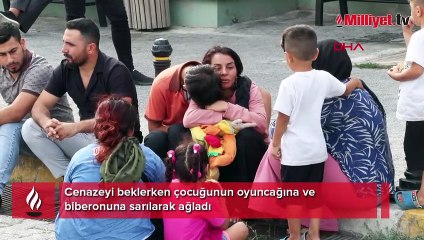 Çocuğunun oyuncağına ve biberonuna sarılarak ağladı