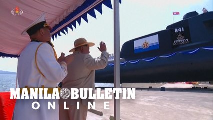 North Korean leader Kim Jong Un presides over tactical nuclear submarine unveiling ceremony