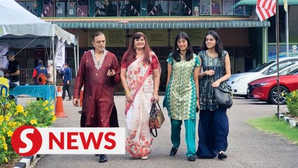 Pulai by-election: Family stops to vote on the way to wedding in Kluang