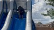 Fun uncle's epic waterslide adventure backfires when he fails to stick the landing!