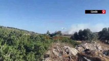 İzmir Çeşme'de çöplükte çıkan yangın ormana sıçradı