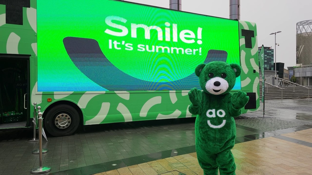 AO brings a bright green ‘kitchen disco’ party bus to MediaCity after touring UK festivals all summer