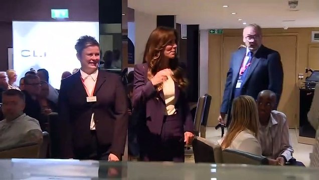 HM-Princess! Kate meets Penny the sniffer dog and an ex-Madness roadie on royal visit to prison - and doesn't let hand injury stop her after 'falling while trampolining with her children'