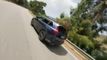 2023 Honda CR-V e:HEV in Canyon River Blue Driving in the country