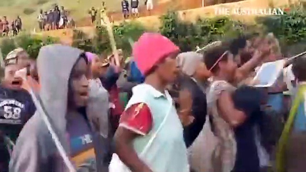 PNG tribal warfare swarm Papua New Guinea