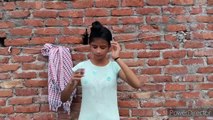 Beautiful girl drying her hair in traditional towel style in sunlight with her soft_shiny-silky hair
