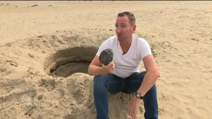 ‘Mysterious crater’ found on beach from ‘cosmic event’ turns out to be a hole dug by friends having fun