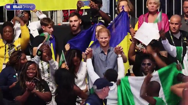 Meghan dons white Ralph Lauren sweater vest alongside Harry