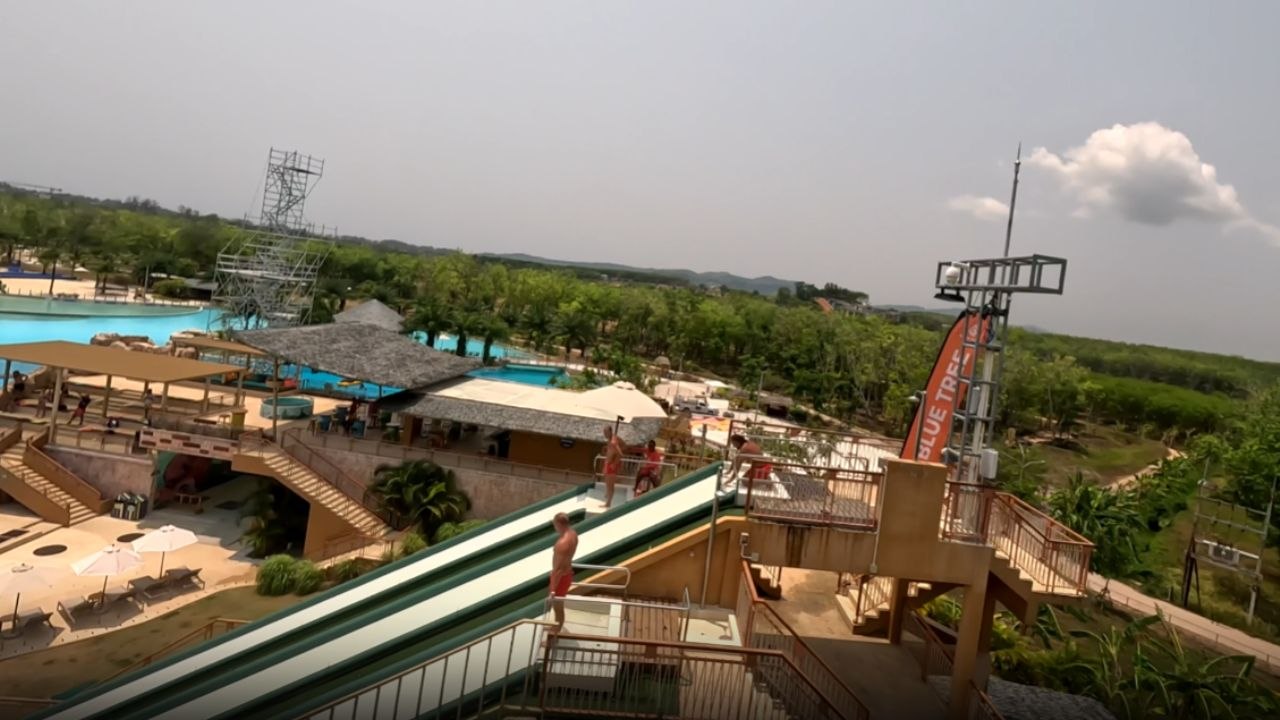 Man amazingly does a full body flip on a waterpark slide *Gymnastic Flips*