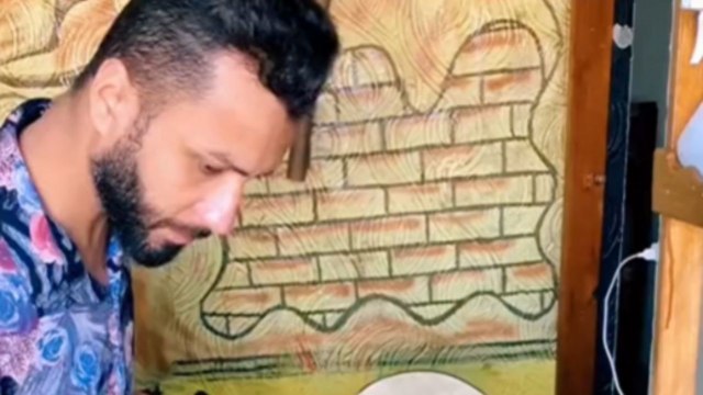 Superfan crafts INCREDIBLE wooden replica of Rengoku's iconic sword from Demon Slayer