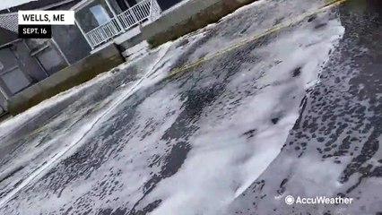 Tony Laubach hit by waves in coastal Maine
