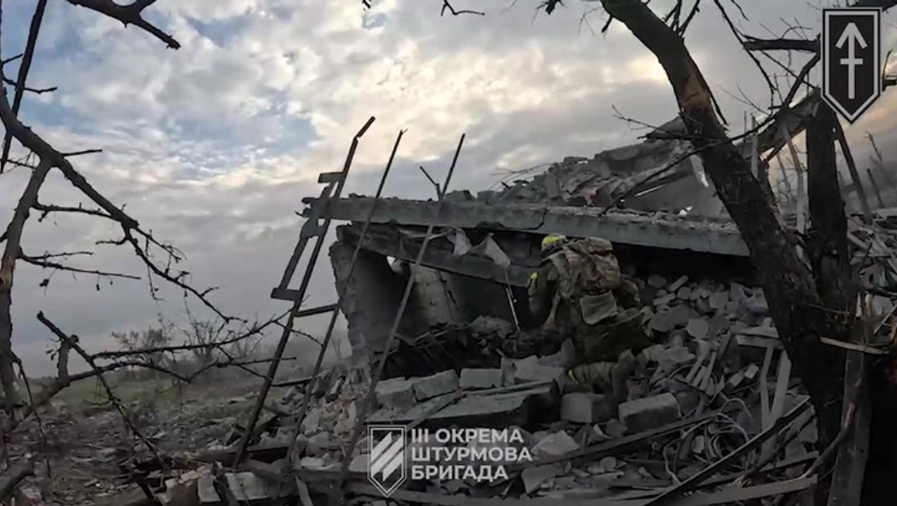 Ukrainian troops move through destroyed Donetsk settlement as Kyiv announces recapture