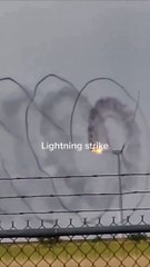 Electrifying Moment: Lightning Strikes Windmill in Spectacular Display!