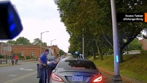 Erschütterndes Video zeigt, wie ein Polizist auf einer belebten Straße von einem Fluchtfahrer mitgeschleift wird