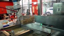 مطاعم في كوريا الجنوبية تستعين بروبوتات لتحضير الدجاج المقلي