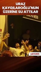 Sokakta şarkı söyleyen Uraz Kaygılaroğlu'na apartmandan su döktüler