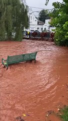 Watch as floodwater rushes through Dawlish