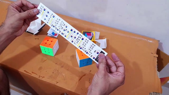 Unboxing and Review of Rubiks Cube 3x3 Cube High Speed and MoYu YJ 3x3x3 Speed Cube Stickerless