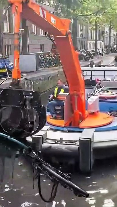 Unveiling Amsterdam's Best-Kept Secrets: Surprises Found in Canal Clean-Up