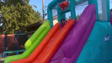 Girl's waterslide adventure ends with her getting tossed out of pool