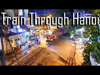 A Walk Along the Train Tracks Right Through Hanoi