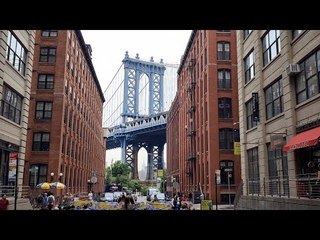 Walking Over Manhattan Bridge with Brooklyn Bridge And New York City  Skyline Views