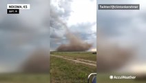 Large landspout swirls around Kansas farmland