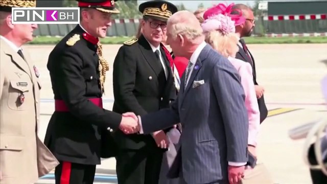 La royale welcome! Charles is greeted with shouts of 'King' from Paris balconies while walking through streets with Macron as pair exchange gifts and share jokes before holding talks at the Elysee Palace ahead of lavish dinner to mark state visit
