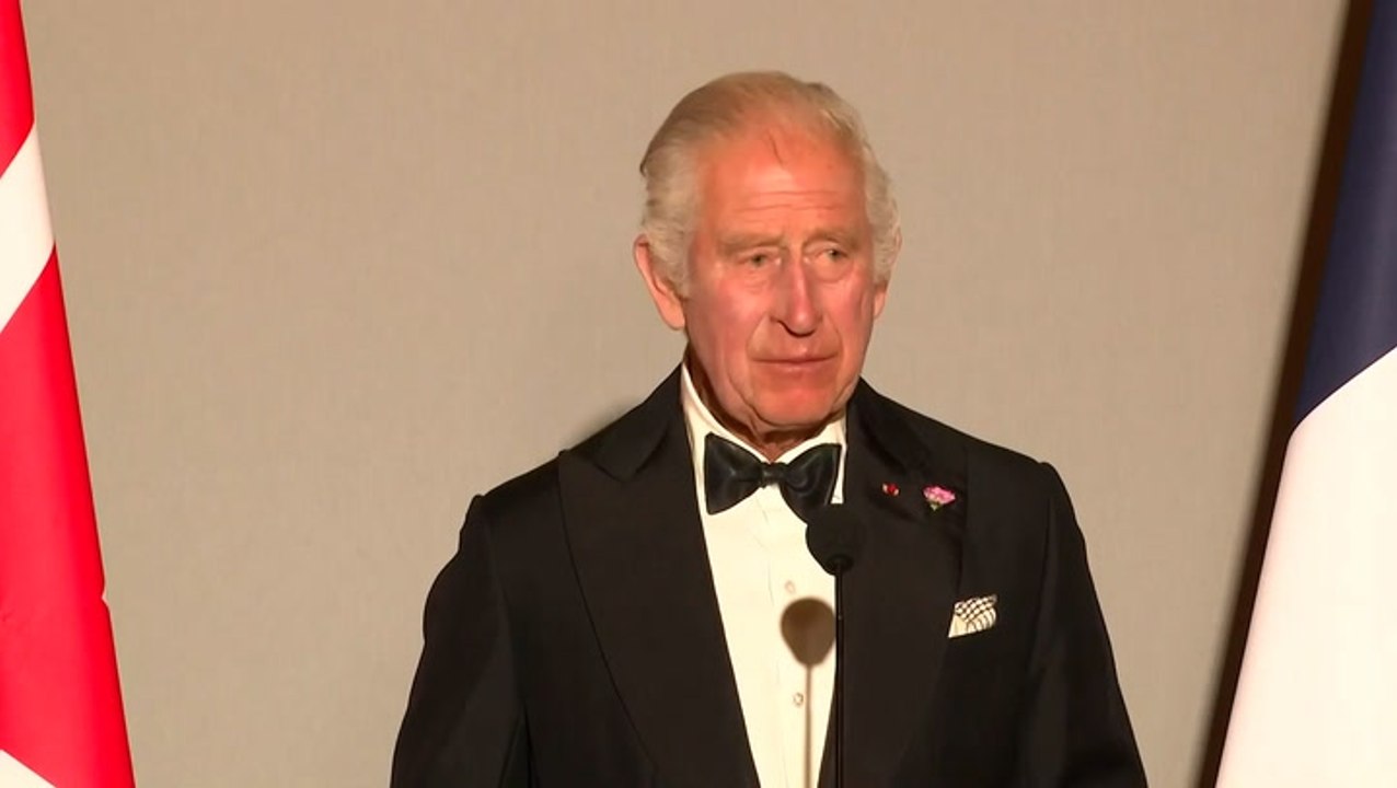King Charles makes reference to late Queen as h...