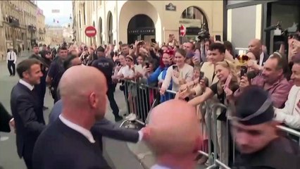 King Charles and President Macron greet well wishers in Paris