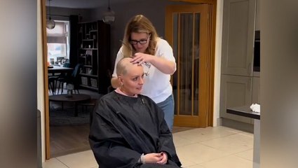 Watch: Strictly’s Amy Dowden’s family help her shave head amid cancer battle