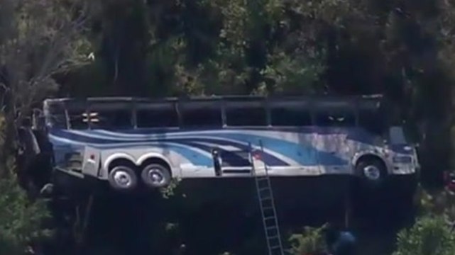 Overturned bus seen in aerial footage after fatal crash involving high school band