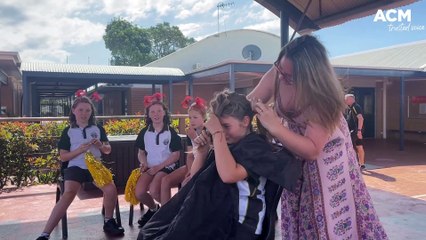 Matilda Strath shaving head for charity
