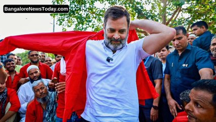 Rahul Gandhi carries bag on head, wears coolie uniform at Delhi station